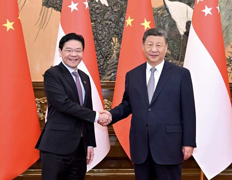 中国国家主席习近平会见新加坡总理黄循财 新方表示反对“台独”