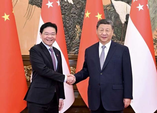 中国国家主席习近平会见新加坡总理黄循财 新方表示反对“台独”