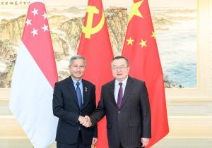 中共中央对外联络部部长刘建超会见新加坡人民行动党中央外事委员会主席、新加坡外长维文