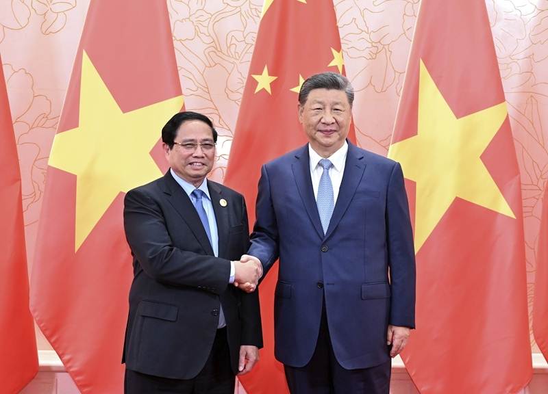 中国国家主席习近平会见越南总理范明政：中越要坚定道路自信和制度自信  
