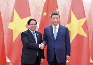 中国国家主席习近平会见越南总理范明政：中越要坚定道路自信和制度自信  