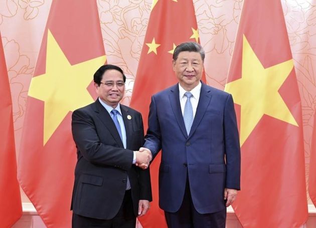 中国国家主席习近平会见越南总理范明政：中越要坚定道路自信和制度自信  