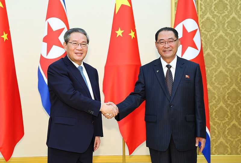 中国总理李强同朝鲜内阁总理朴泰成会谈