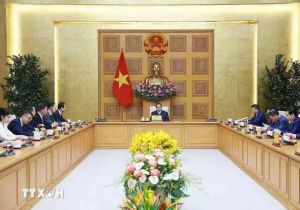 越南政府总理范明政会见中国驻越南大使何炜