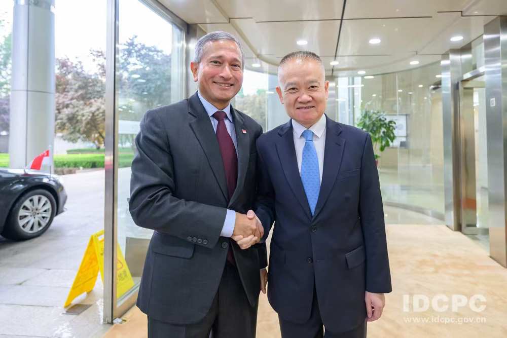 中共中央对外联络部部长刘海星会见新加坡人民行动党中央外事委员会主席、政府外长维文