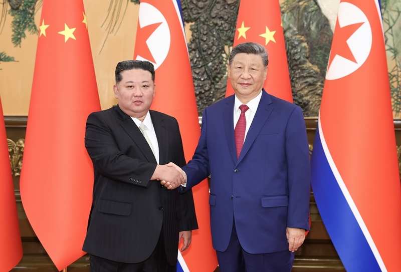 中国最高领导人习近平同朝鲜最高领导人金正恩就《中朝友好合作互助条约》签订65周年互致贺电