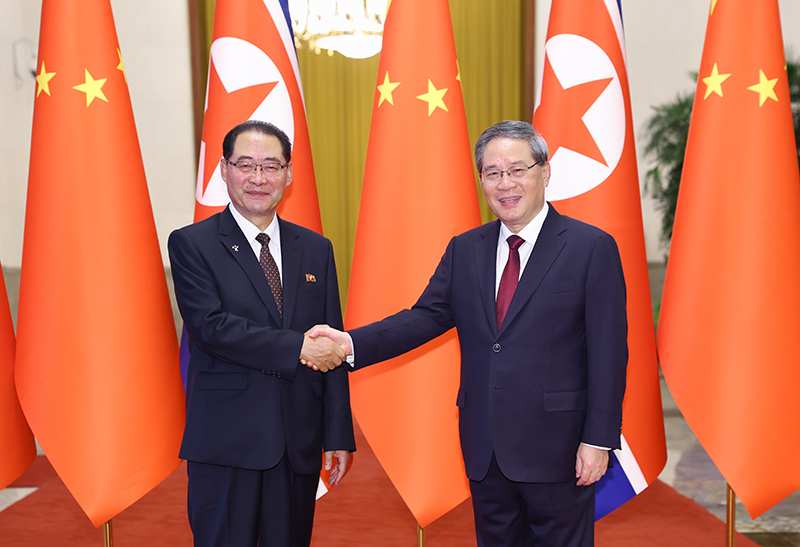 中国总理李强同朝鲜内阁总理朴泰成会谈